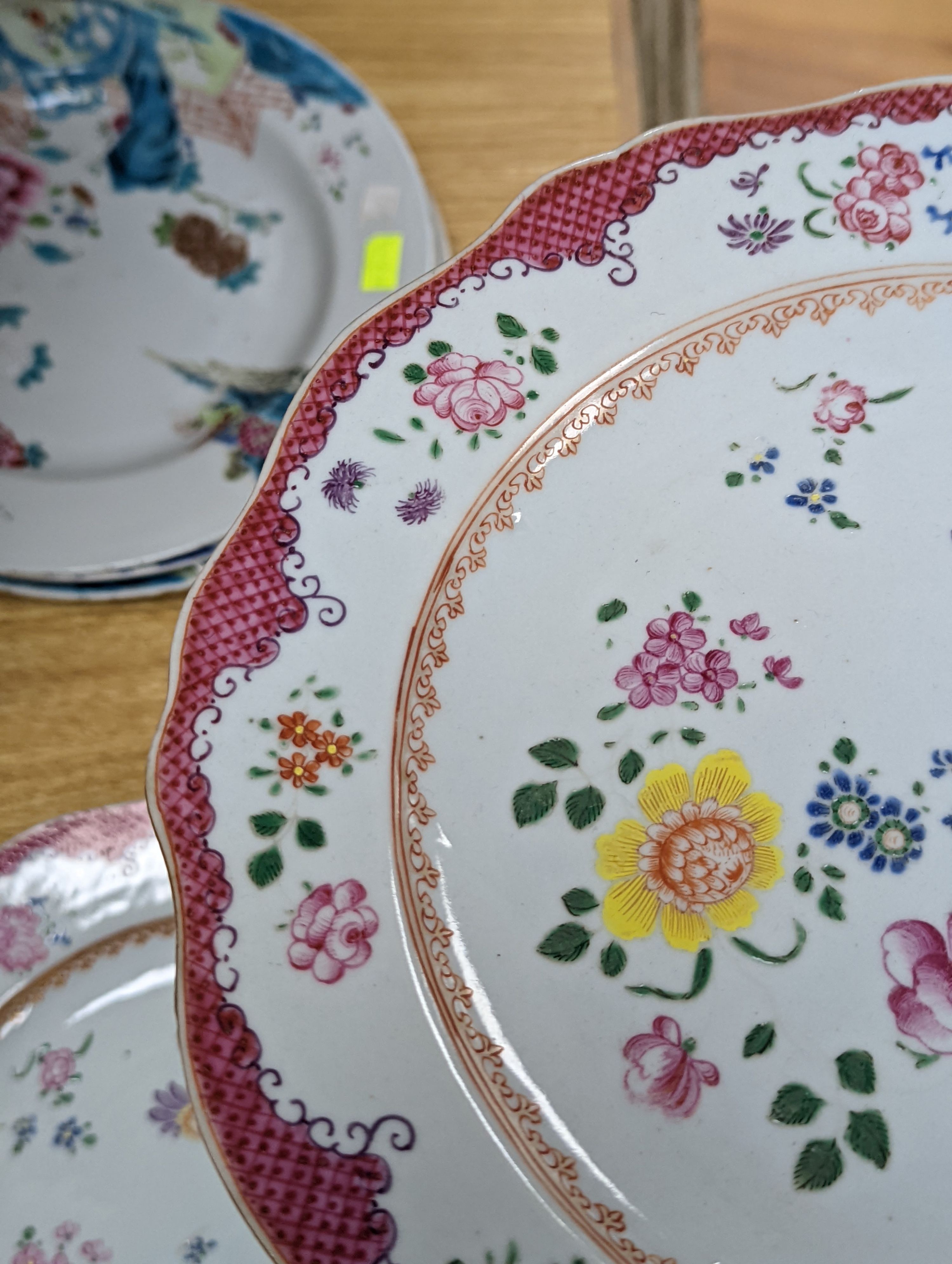 Two pairs of 18th century Chinese famille rose plates and an Imari plate, 26cm